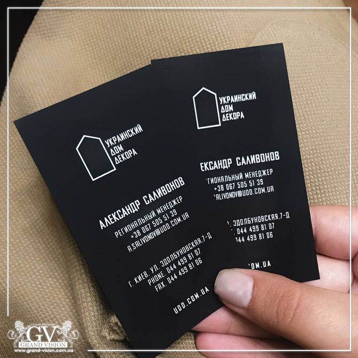 Business cards on black cardboard