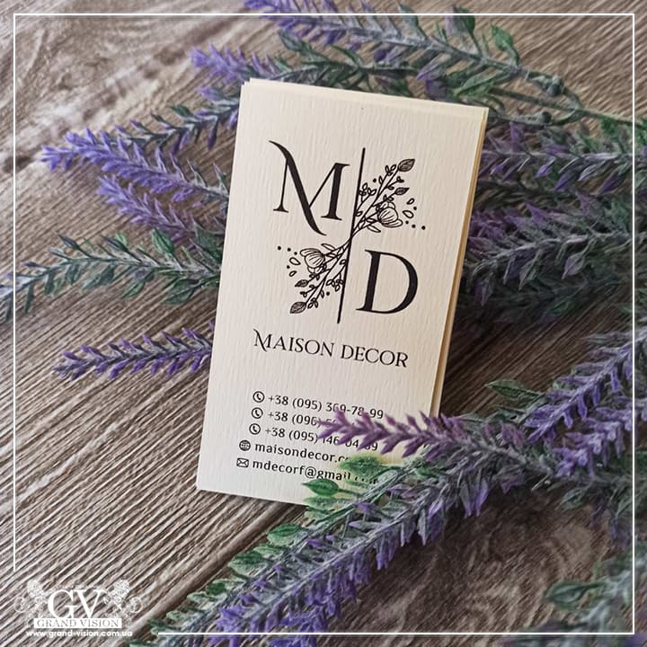 Business cards with custom logo on designer paper